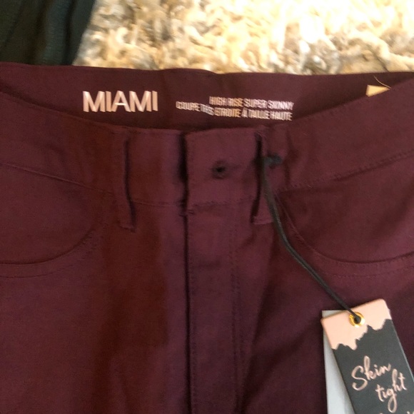 2 pairs of high rise skin tight skinnies - green & maroon reg price $34.99 ea. - Picture 5 of 7